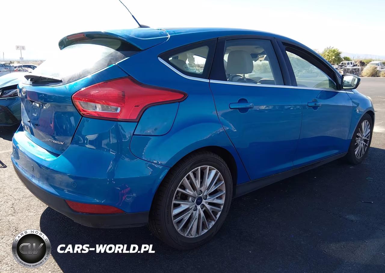 2016 Ford Focus Titanium VIN:1FADP3N29GL335507 - 4