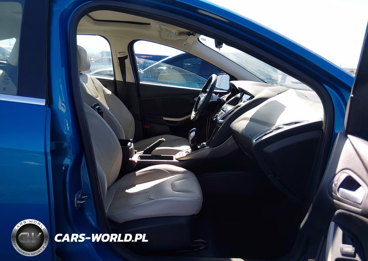 2016 Ford Focus Titanium VIN:1FADP3N29GL335507 - 5