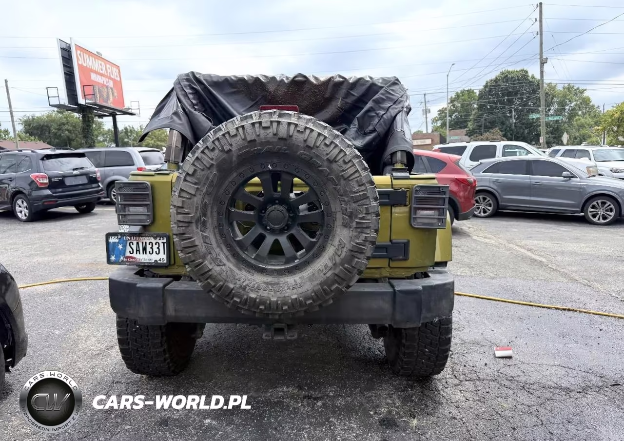 2007 Jeep Wrangler Unlimited Sahara VIN:1J4GA59157L155702 - 11