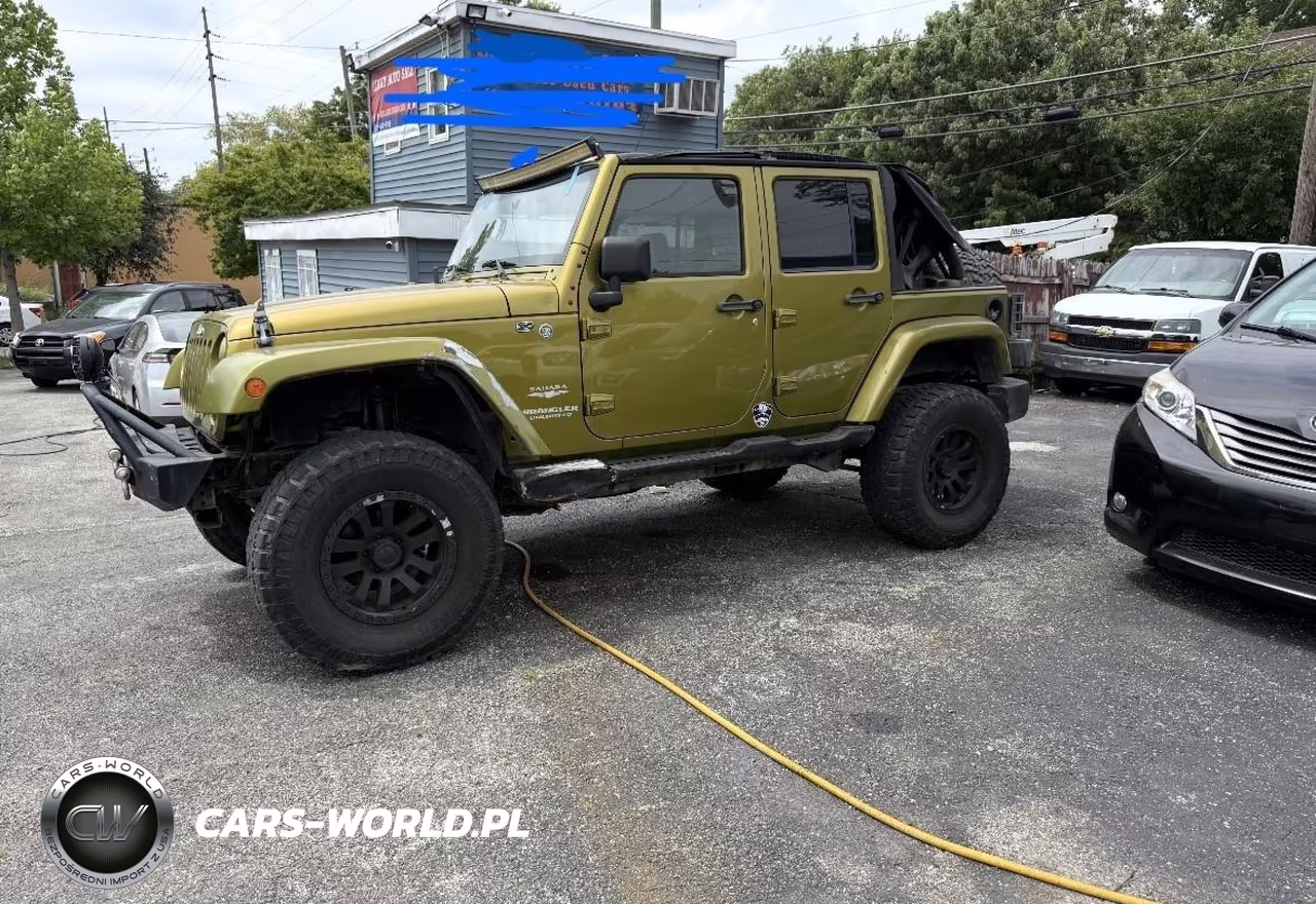 2007 Jeep Wrangler Unlimited Sahara VIN:1J4GA59157L155702 - 12