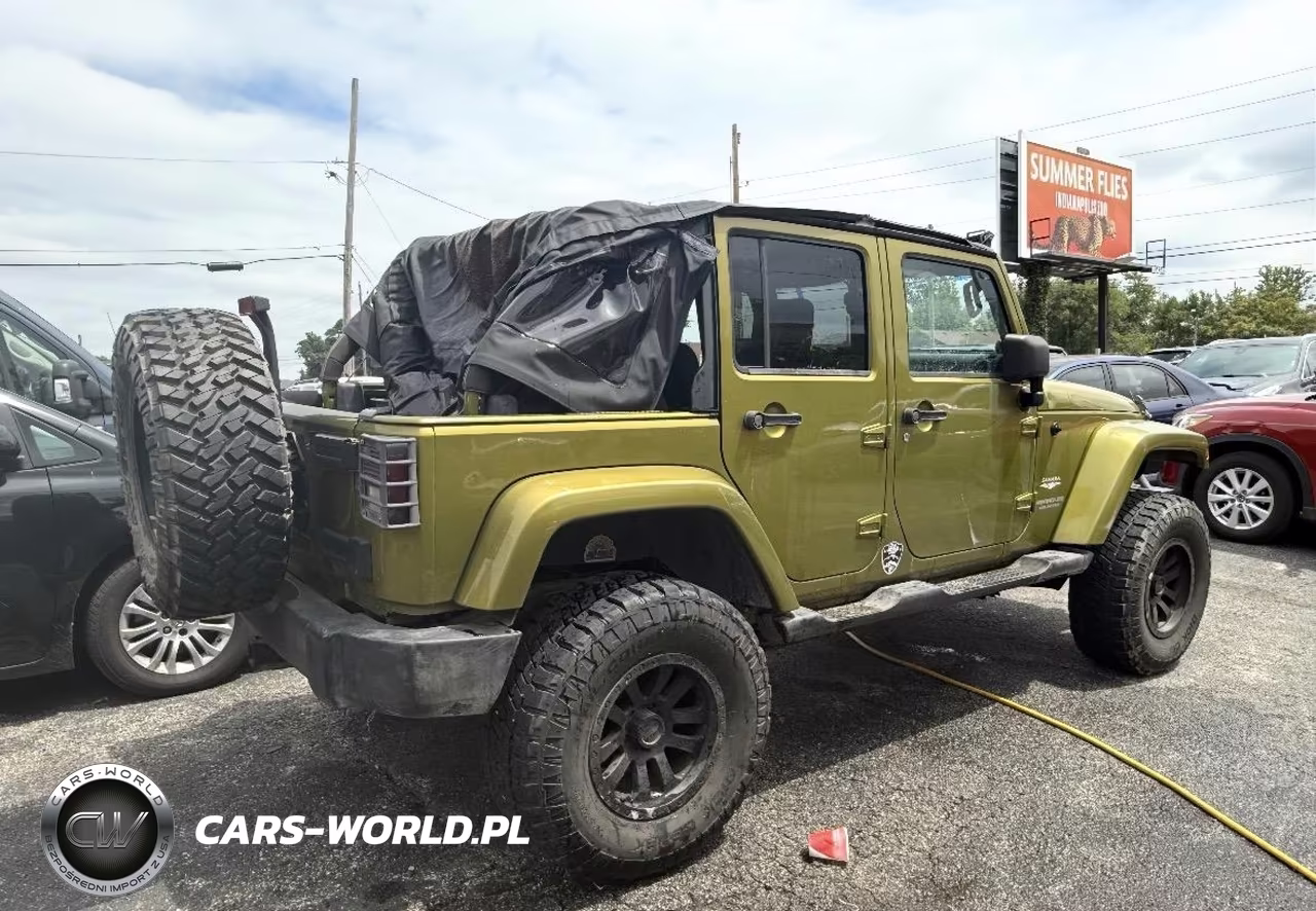 2007 Jeep Wrangler Unlimited Sahara VIN:1J4GA59157L155702 - 4