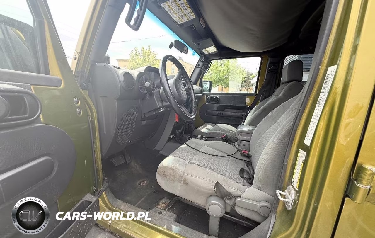 2007 Jeep Wrangler Unlimited Sahara VIN:1J4GA59157L155702 - 5