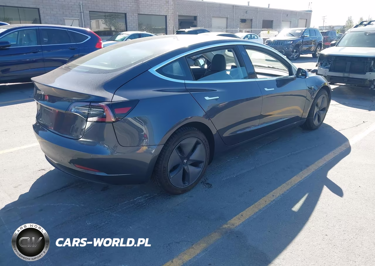 2018 Tesla Model 3 Long Range-Mid Range VIN:5YJ3E1EA8JF051027 - 4