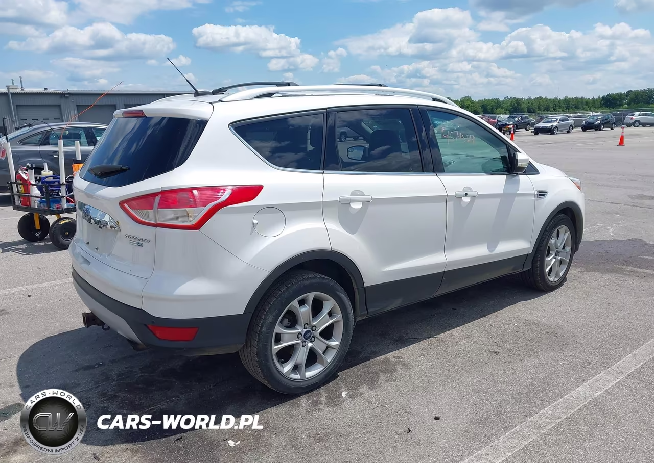 2016 Ford Escape Titanium VIN:1FMCU9J94GUC25426 - 4