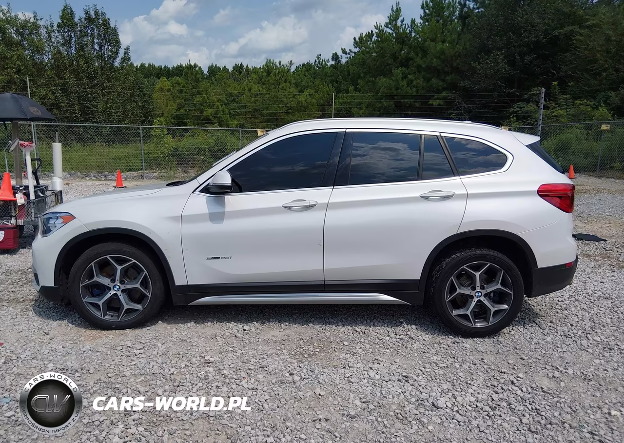 2018 BMW X1 Sdrive28I VIN:WBXHU7C30J5H43077 - 14