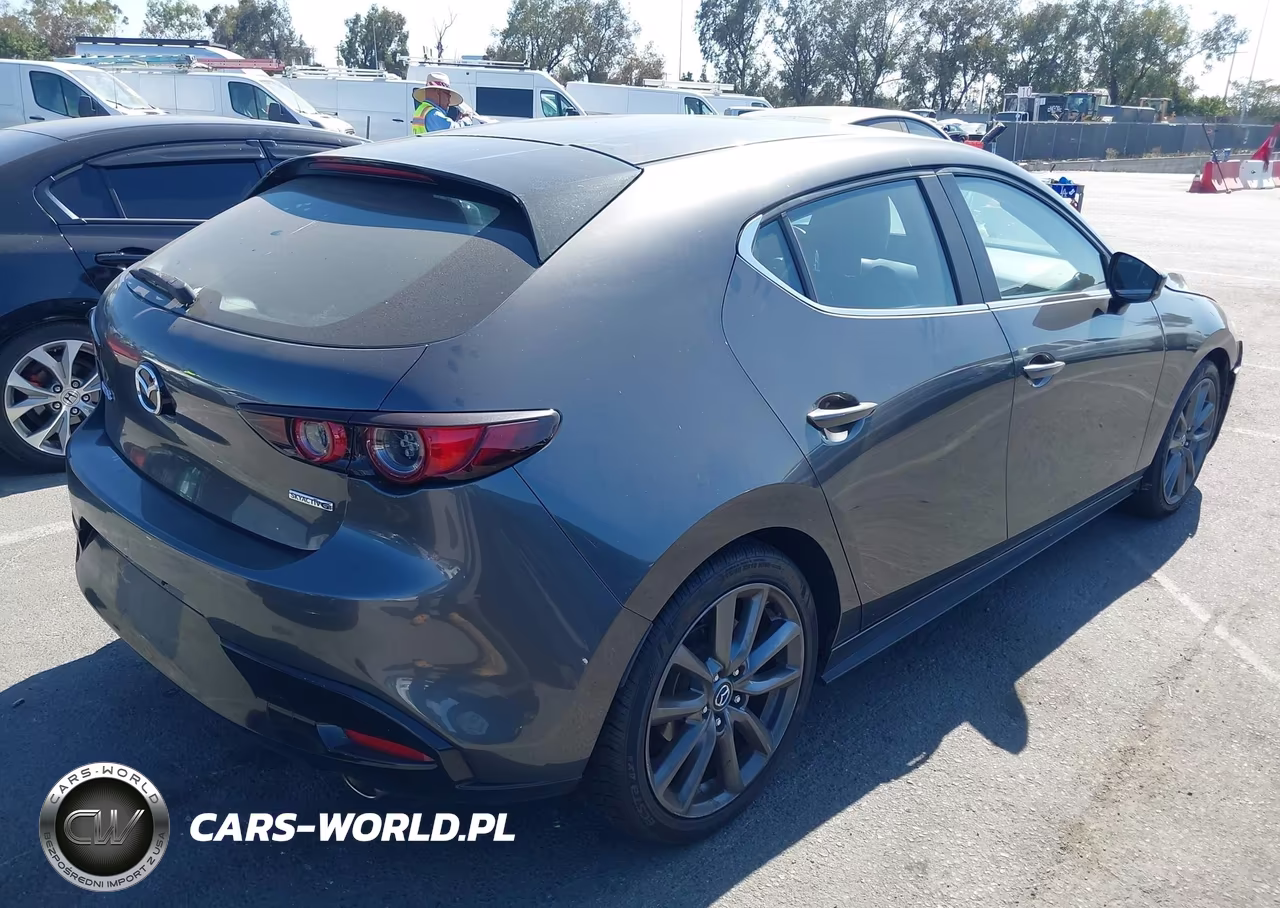 2019 Mazda Mazda3 VIN:JM1BPAJM0K1119336 - 4