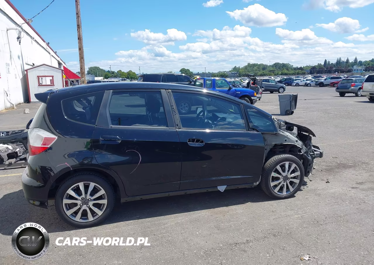 2012 Honda Fit Sport VIN:JHMGE8H50CC022404 - 14