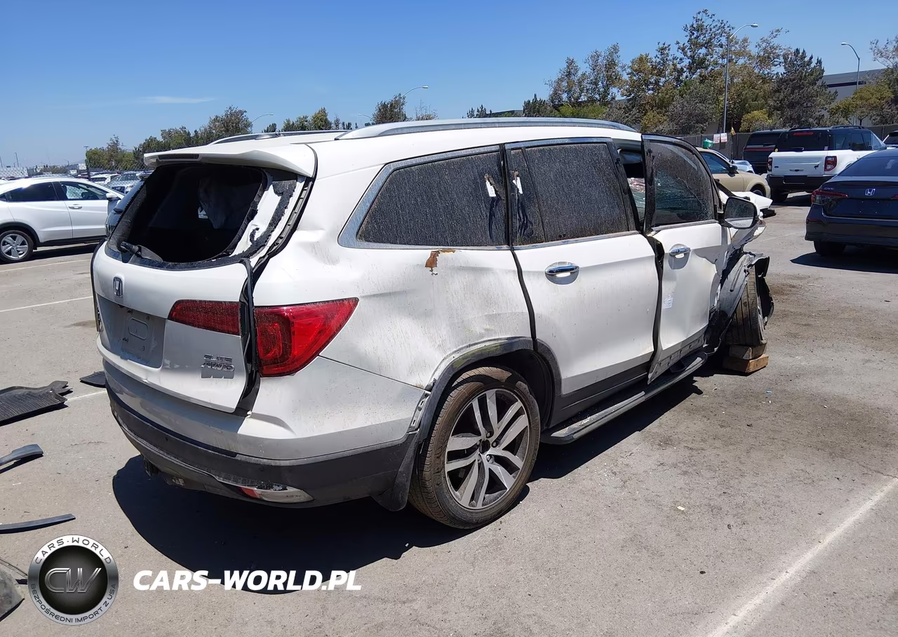 2018 Honda Pilot Elite VIN:5FNYF6H06JB003027 - 4