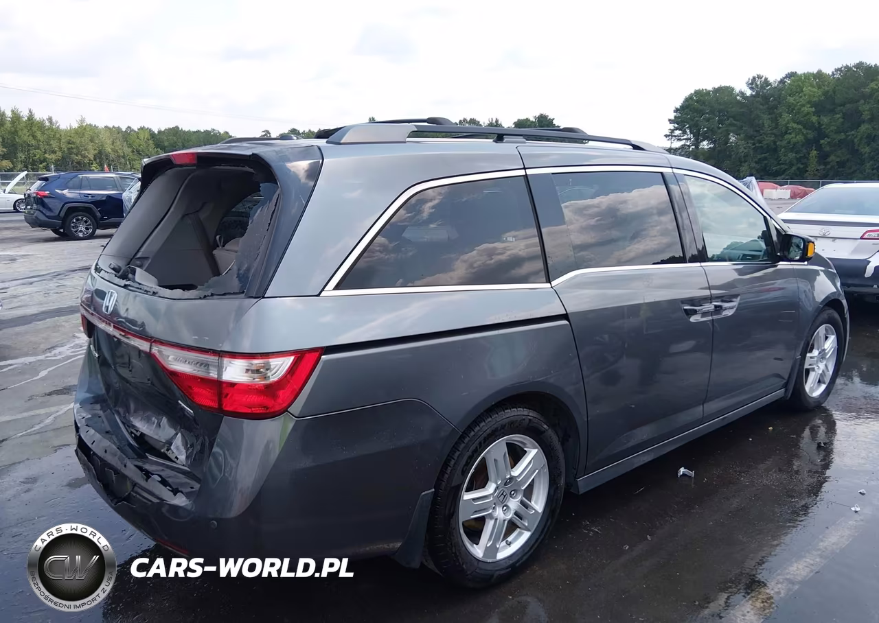 2011 Honda Odyssey Touring-Touring Elite VIN:5FNRL5H98BB062295 - 4