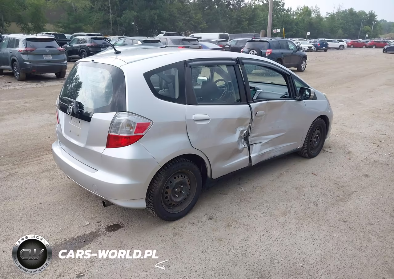 2012 Honda Fit VIN:JHMGE8H35CS004565 - 4