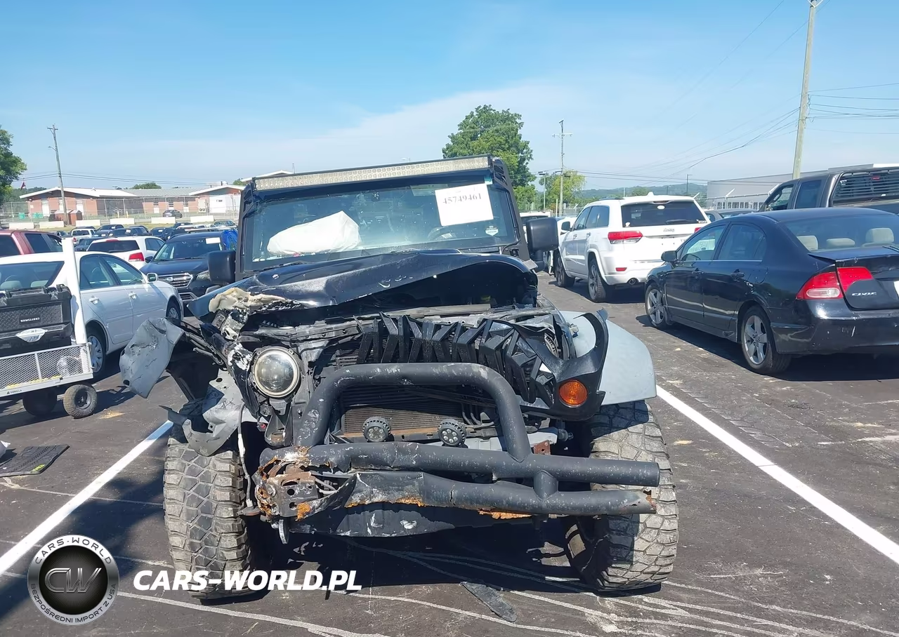 2012 Jeep Wrangler Unlimited Rubicon VIN:1C4HJWFG9CL205083 - 12