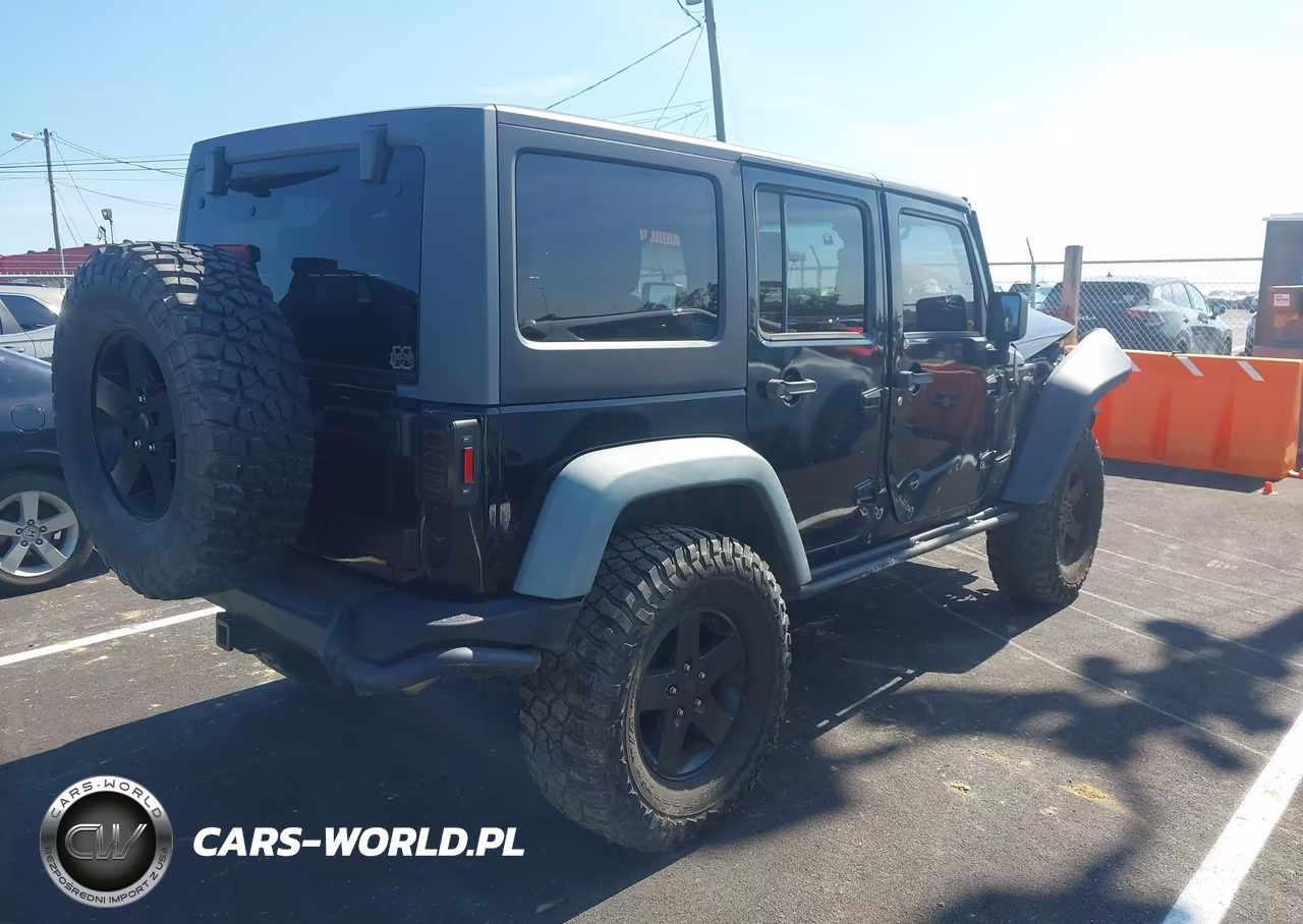 2012 Jeep Wrangler Unlimited Rubicon VIN:1C4HJWFG9CL205083 - 4
