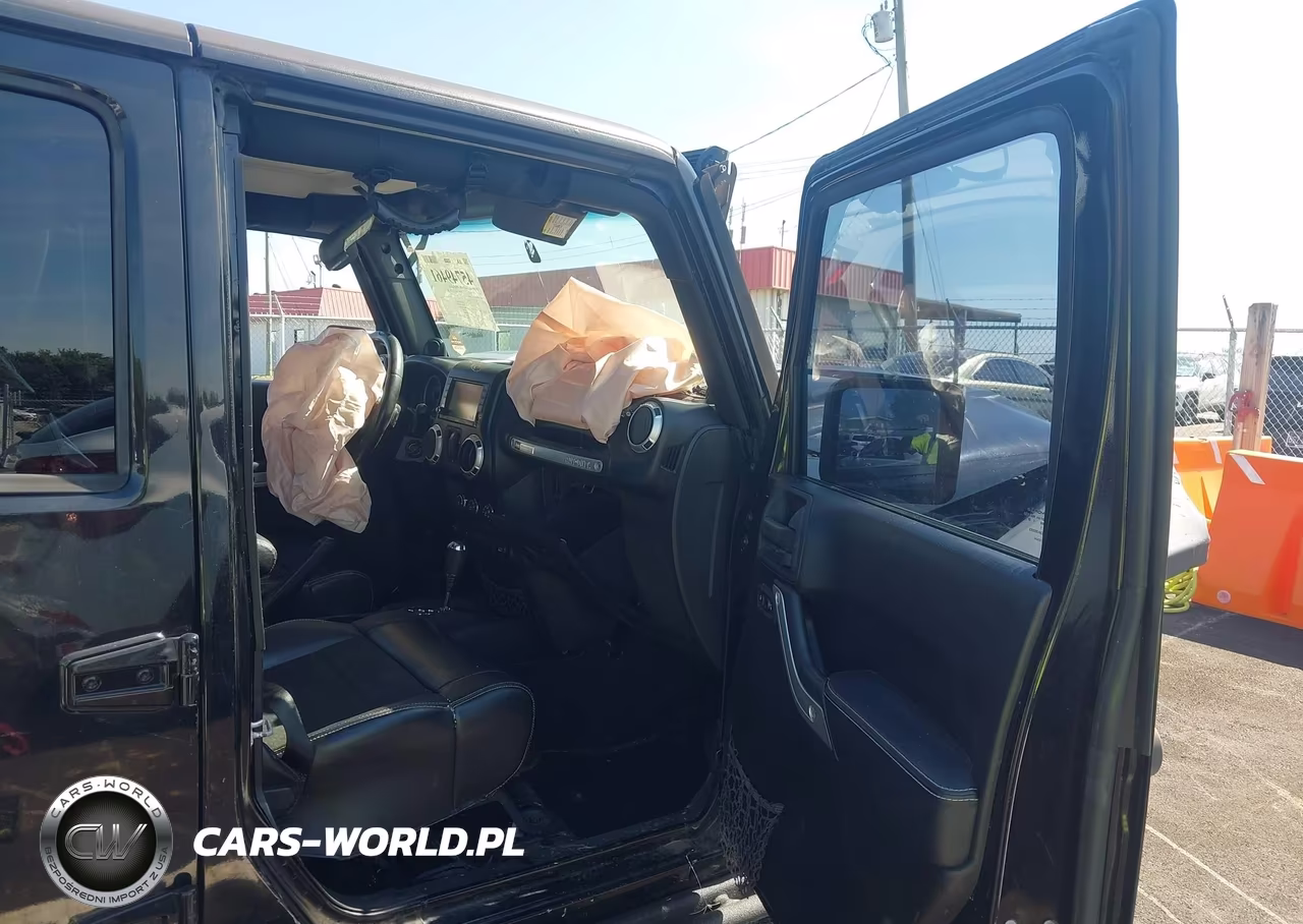 2012 Jeep Wrangler Unlimited Rubicon VIN:1C4HJWFG9CL205083 - 5