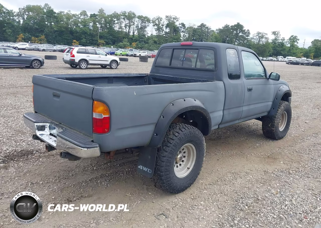 1999 Toyota Tacoma VIN:4TAWM72N4XZ502480 - 4