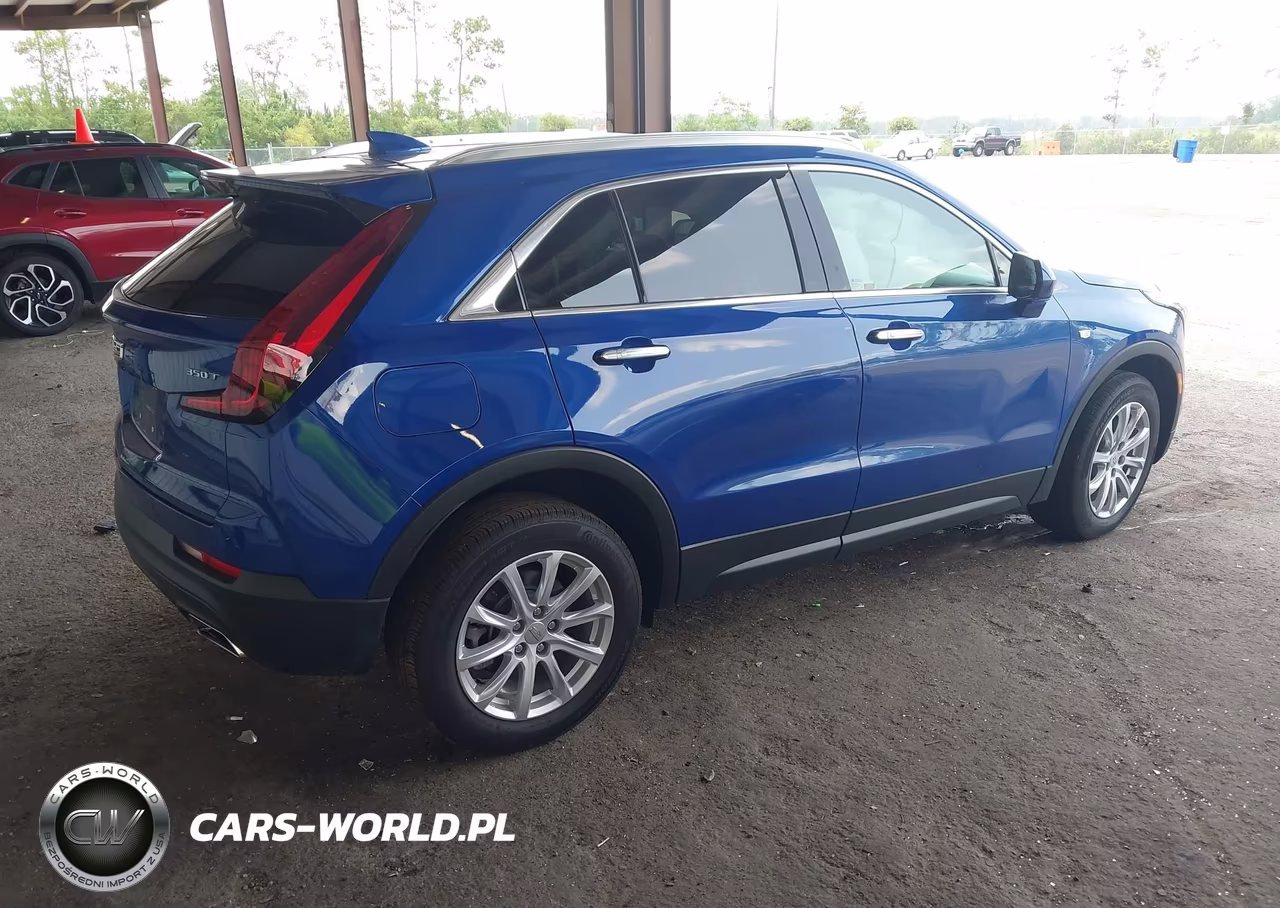 2023 Cadillac Xt4 Fwd Luxury VIN:1GYAZAR45PF106709 - 4