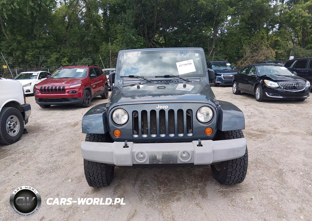 2007 Jeep Wrangler Unlimited Sahara VIN:1J4GA59107L141609 - 12