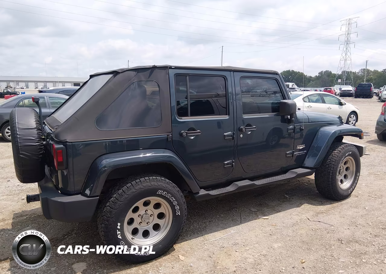 2007 Jeep Wrangler Unlimited Sahara VIN:1J4GA59107L141609 - 13
