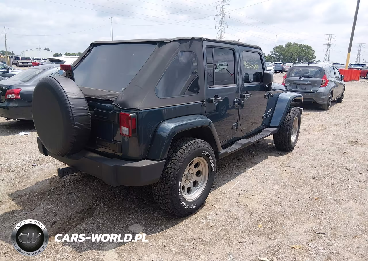 2007 Jeep Wrangler Unlimited Sahara VIN:1J4GA59107L141609 - 4