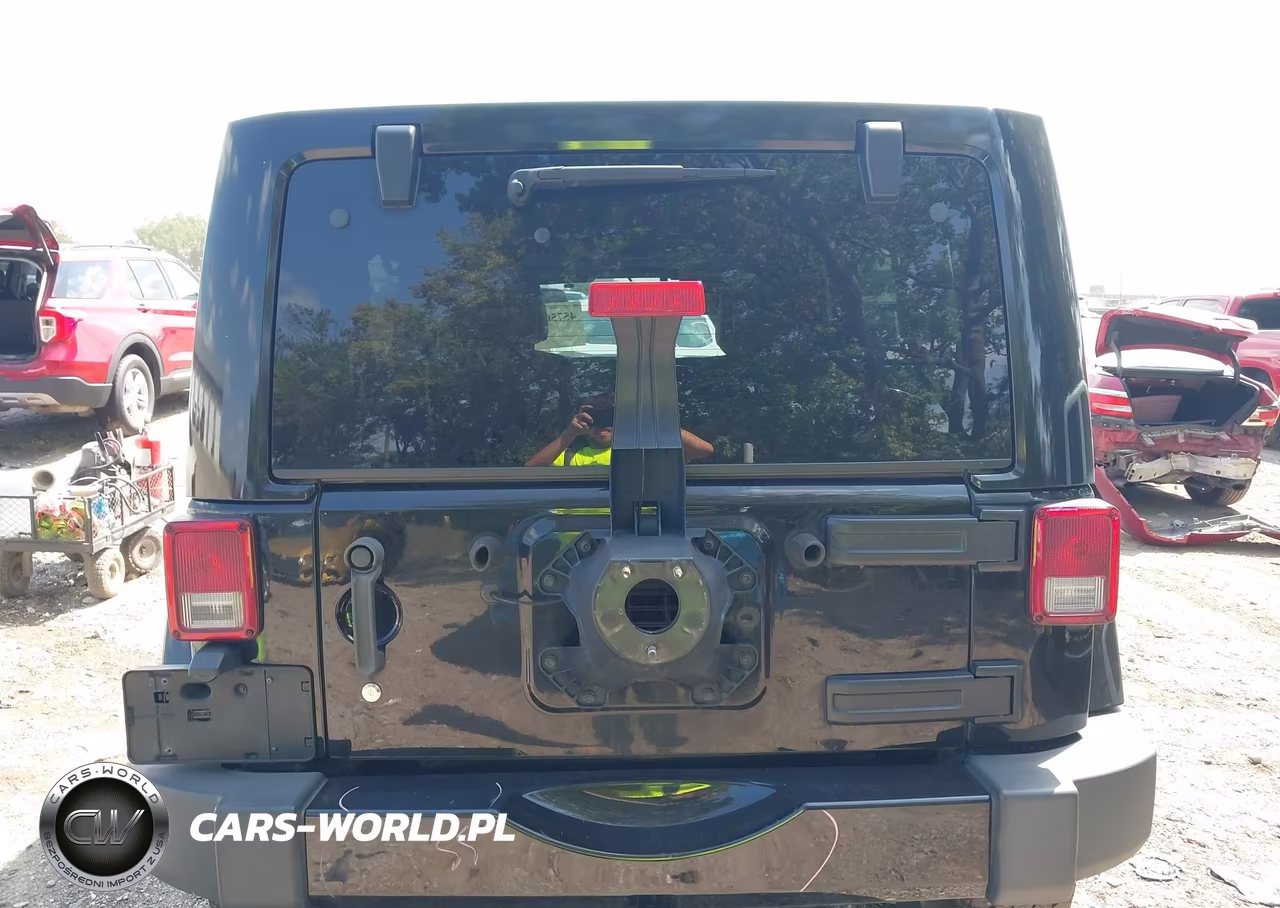 2014 Jeep Wrangler Unlimited Altitude VIN:1C4BJWEG4EL282874 - 16