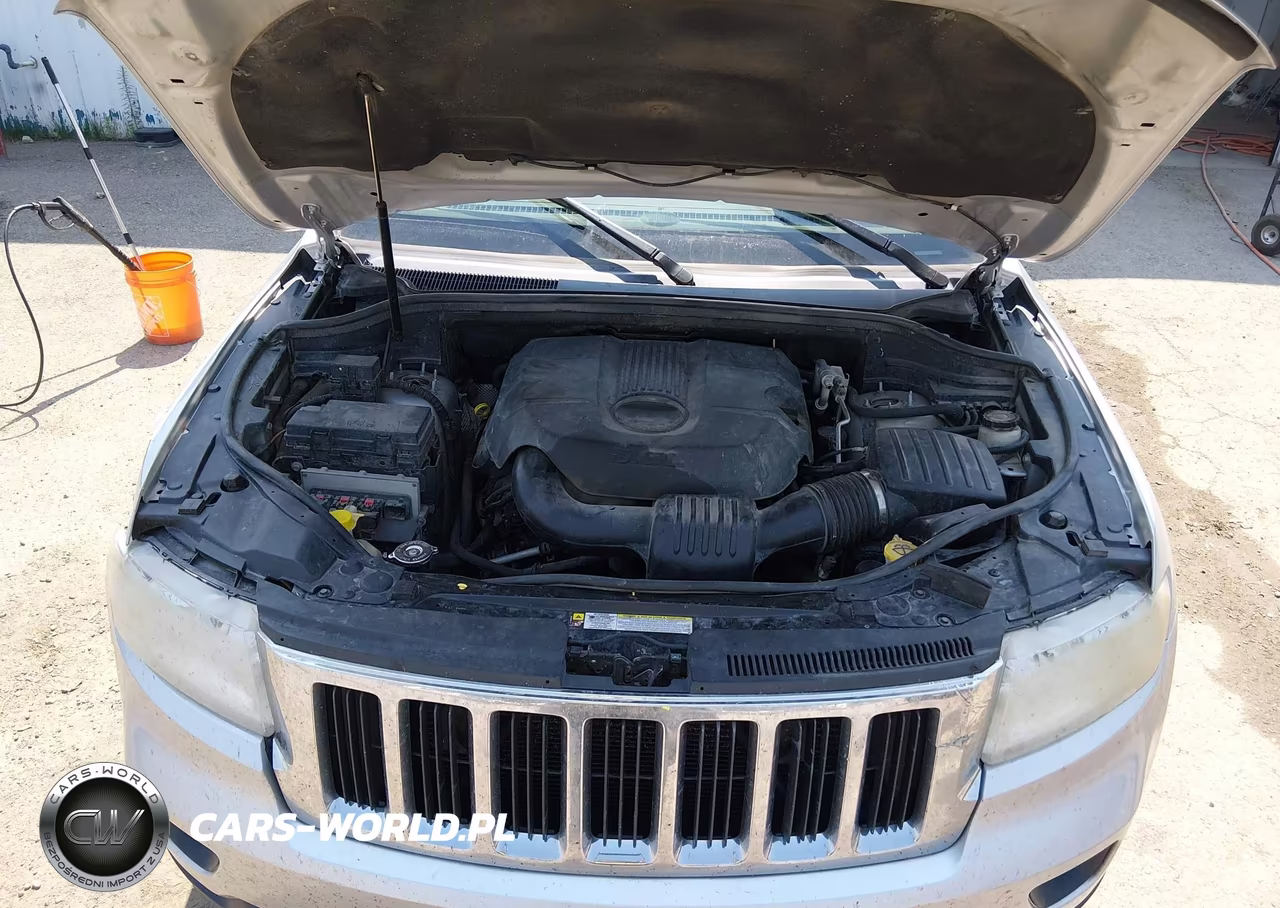 2012 Jeep Grand Cherokee Laredo VIN:1C4RJFAG4CC103718 - 10