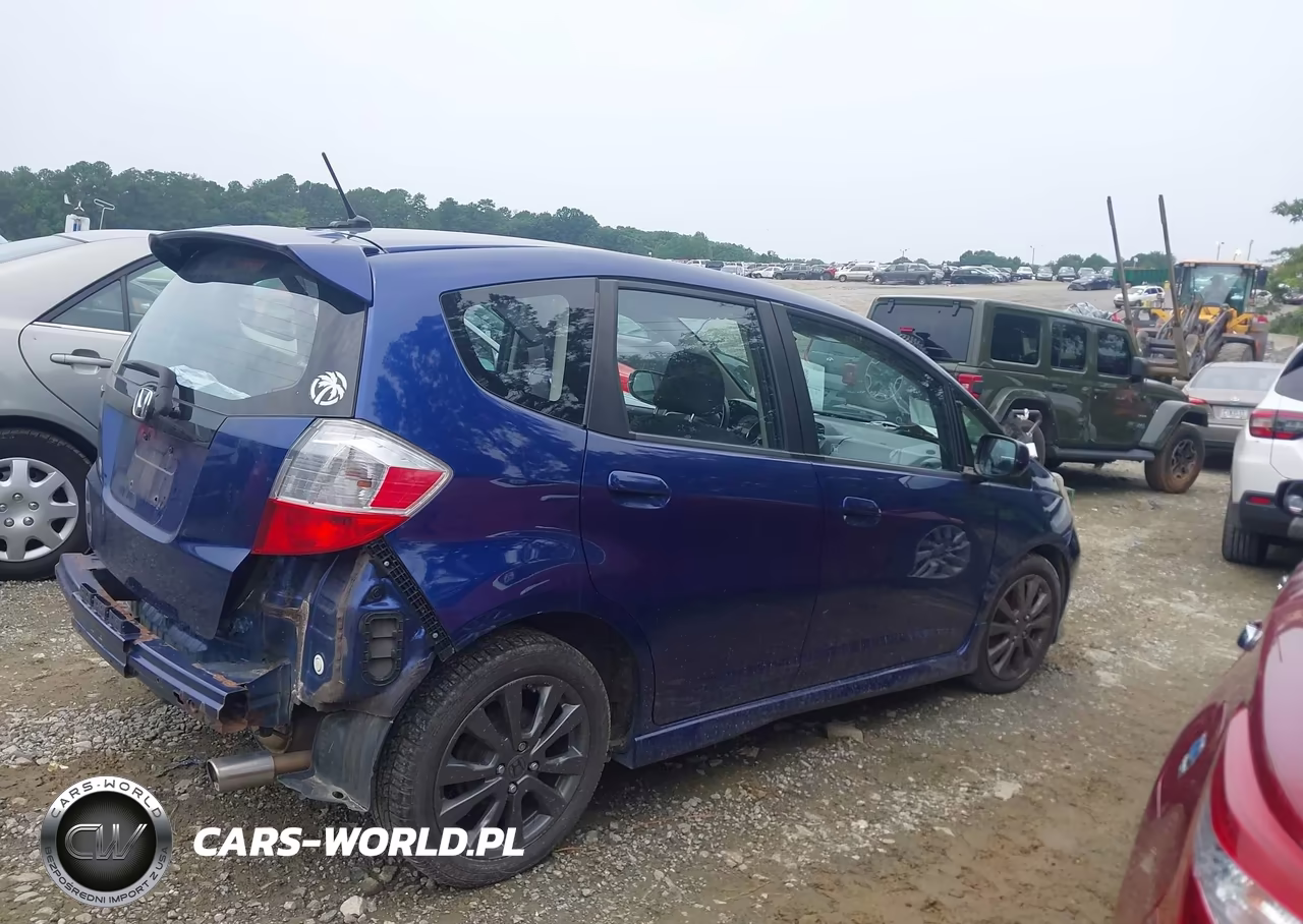 2012 Honda Fit Sport VIN:JHMGE8H59CC036401 - 13