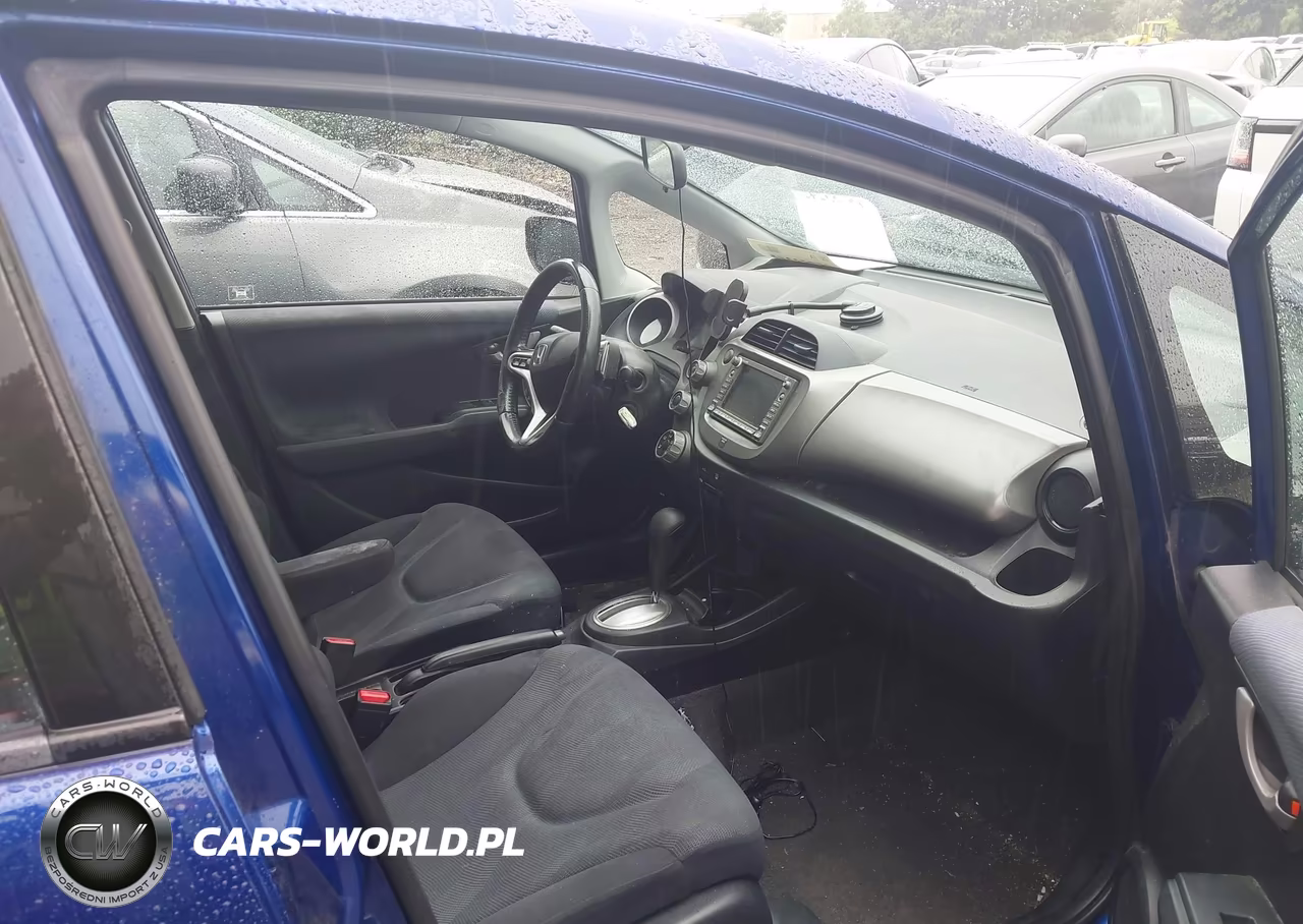 2009 Honda Fit Sport VIN:JHMGE88619S056424 - 5