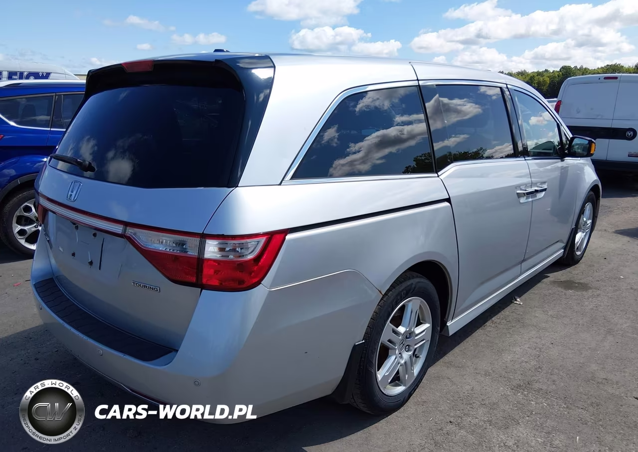 2011 Honda Odyssey Touring-Touring Elite VIN:5FNRL5H96BB005514 - 4