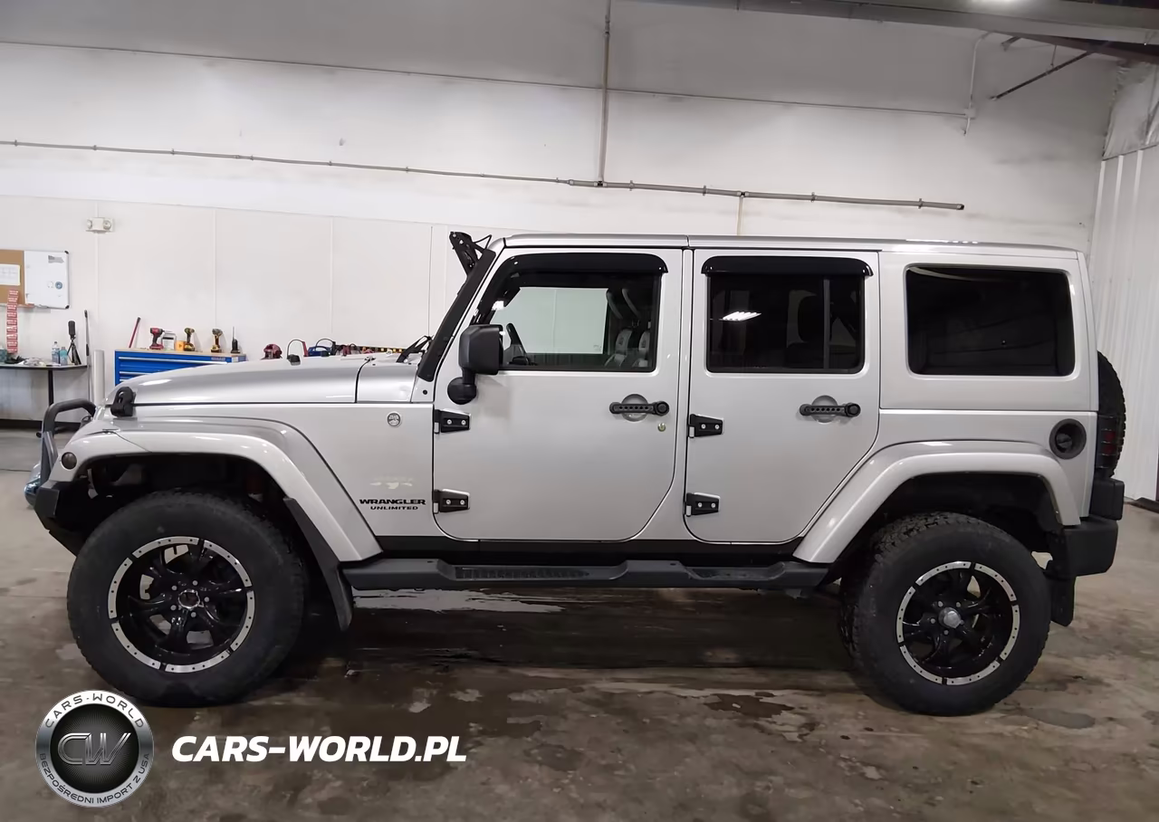 2012 Jeep Wrangler Unlimited Sahara VIN:1C4HJWEGXCL196119 - 14