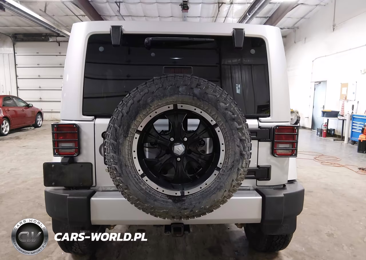 2012 Jeep Wrangler Unlimited Sahara VIN:1C4HJWEGXCL196119 - 16