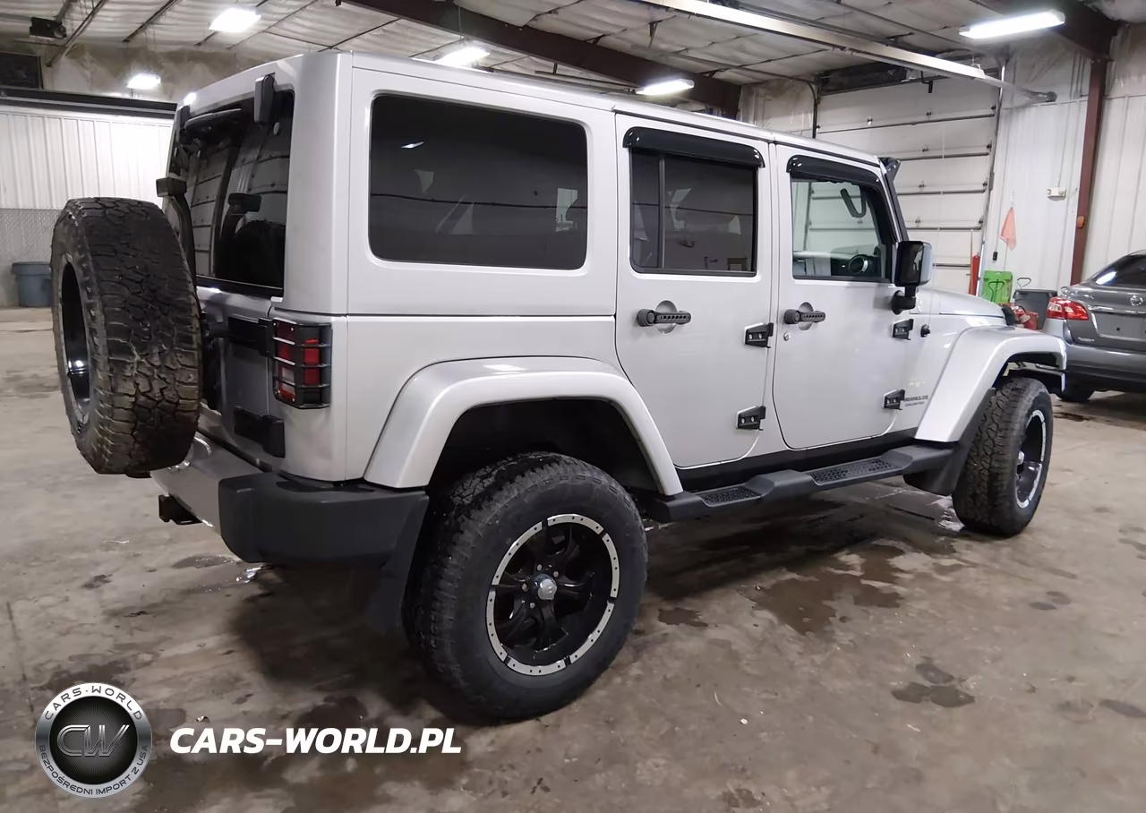 2012 Jeep Wrangler Unlimited Sahara VIN:1C4HJWEGXCL196119 - 4