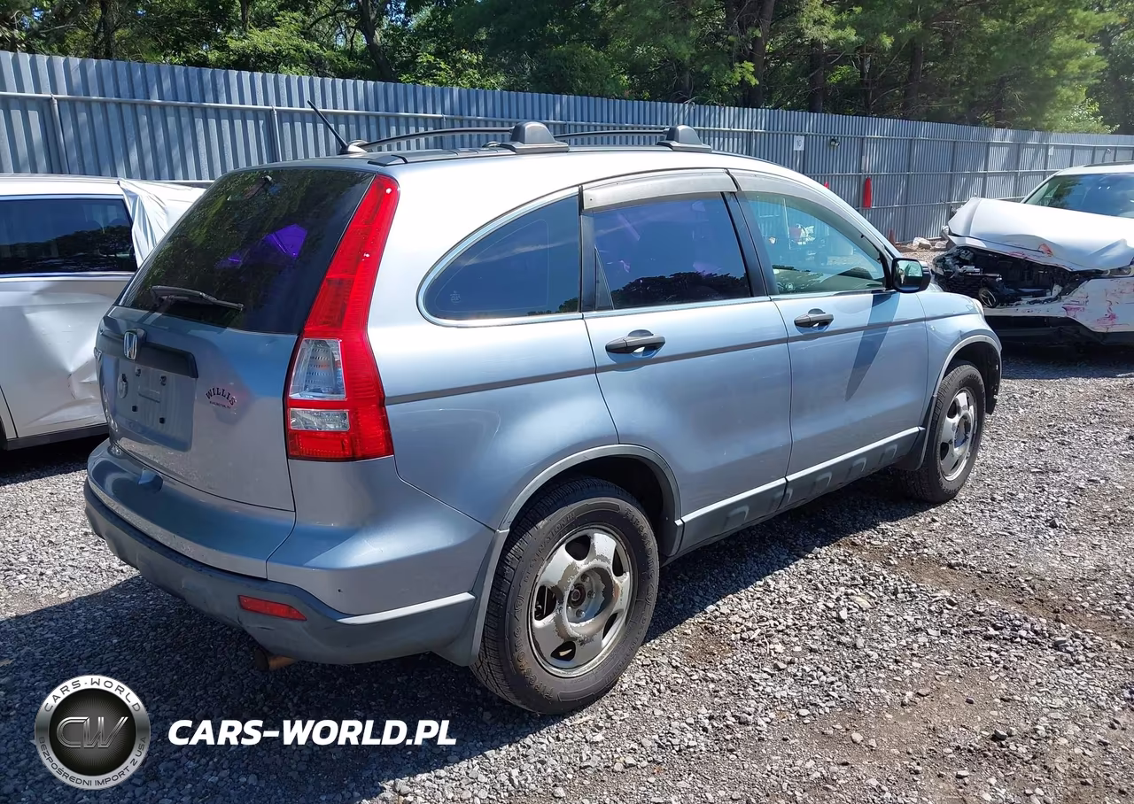 2009 Honda Cr-V Lx VIN:JHLRE48399C018512 - 4