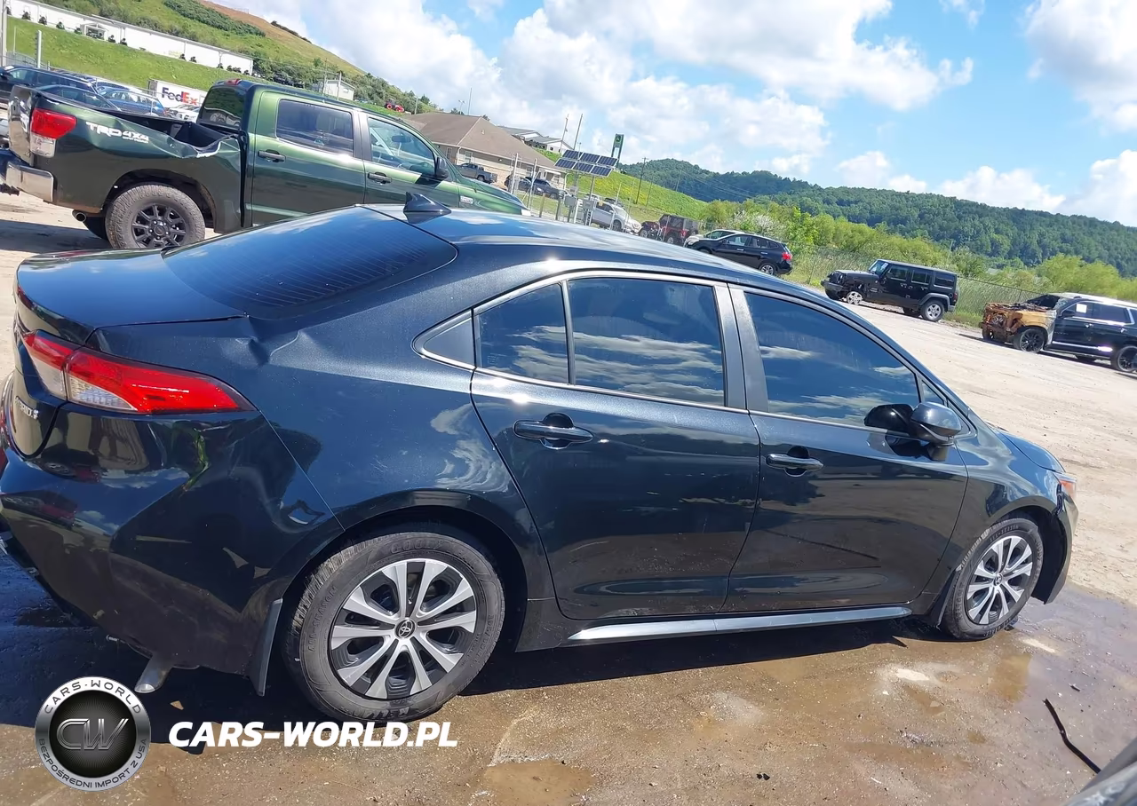 2022 Toyota Corolla Hybrid Le VIN:JTDEAMDE0NJ049751 - 13
