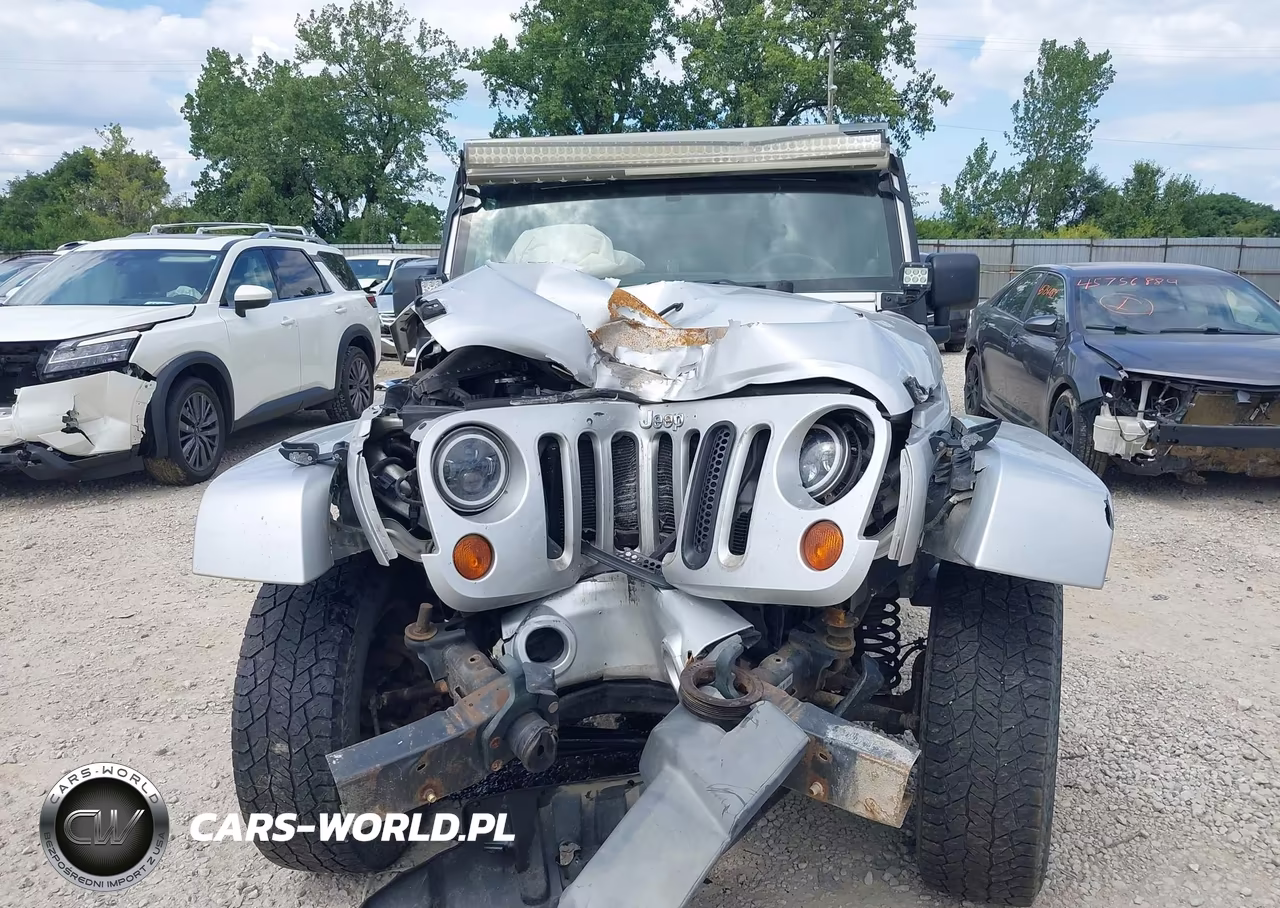 2011 Jeep Wrangler Unlimited Sahara VIN:1J4BA5H14BL512324 - 13