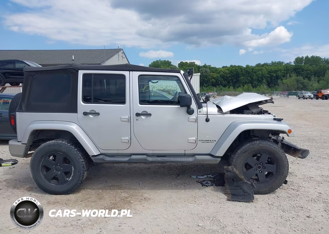 2011 Jeep Wrangler Unlimited Sahara VIN:1J4BA5H14BL512324 - 14