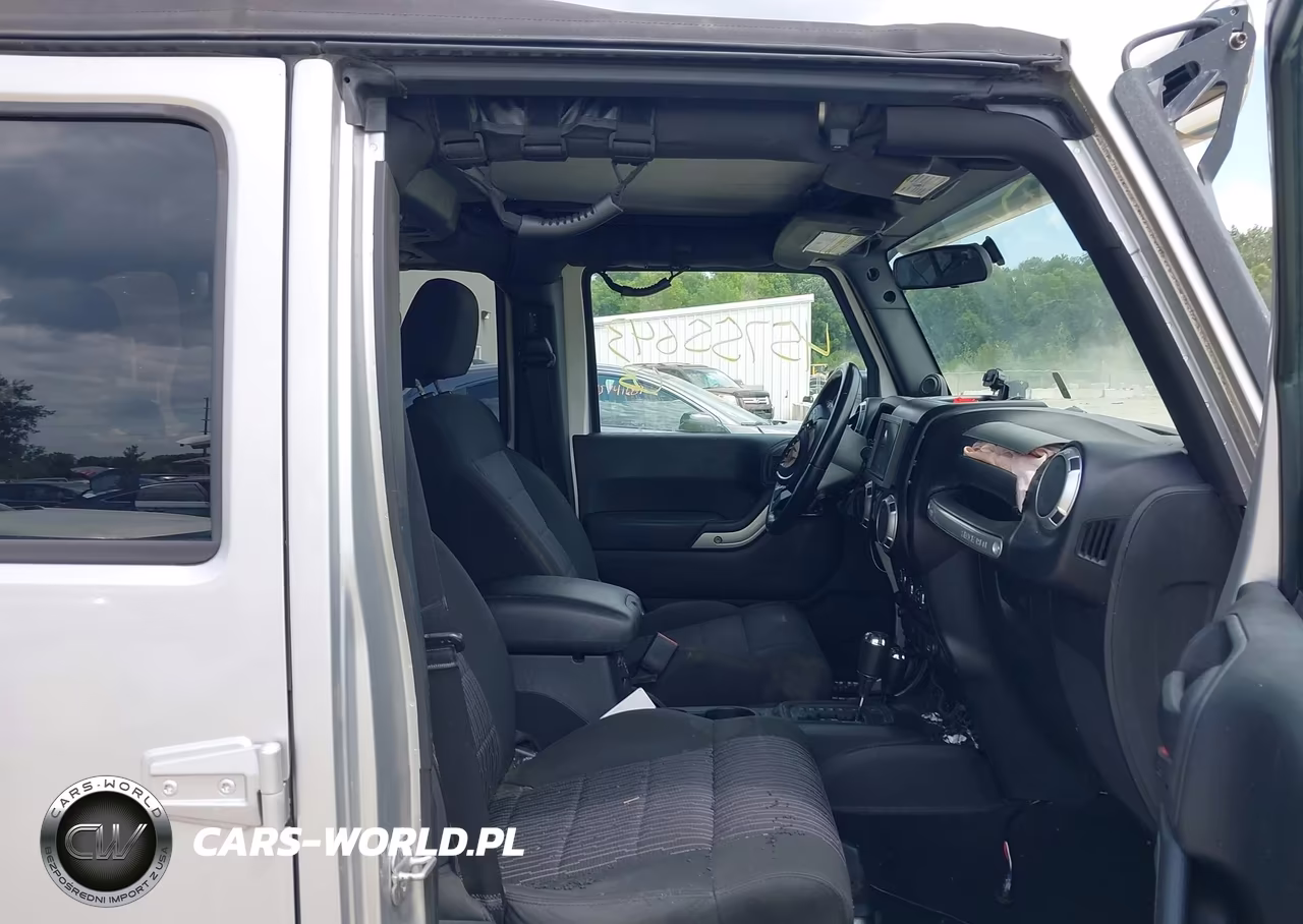2011 Jeep Wrangler Unlimited Sahara VIN:1J4BA5H14BL512324 - 5