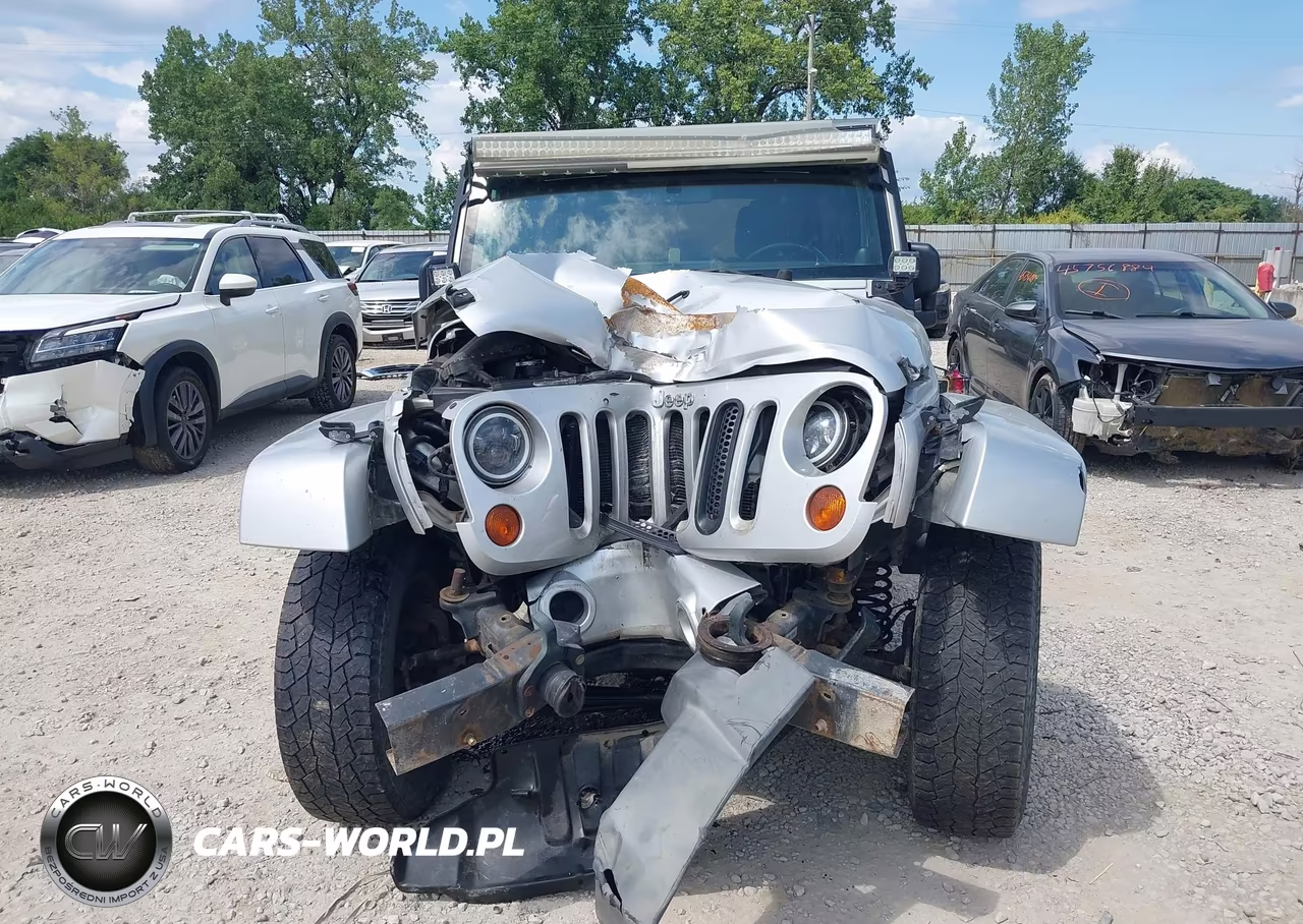 2011 Jeep Wrangler Unlimited Sahara VIN:1J4BA5H14BL512324 - 6
