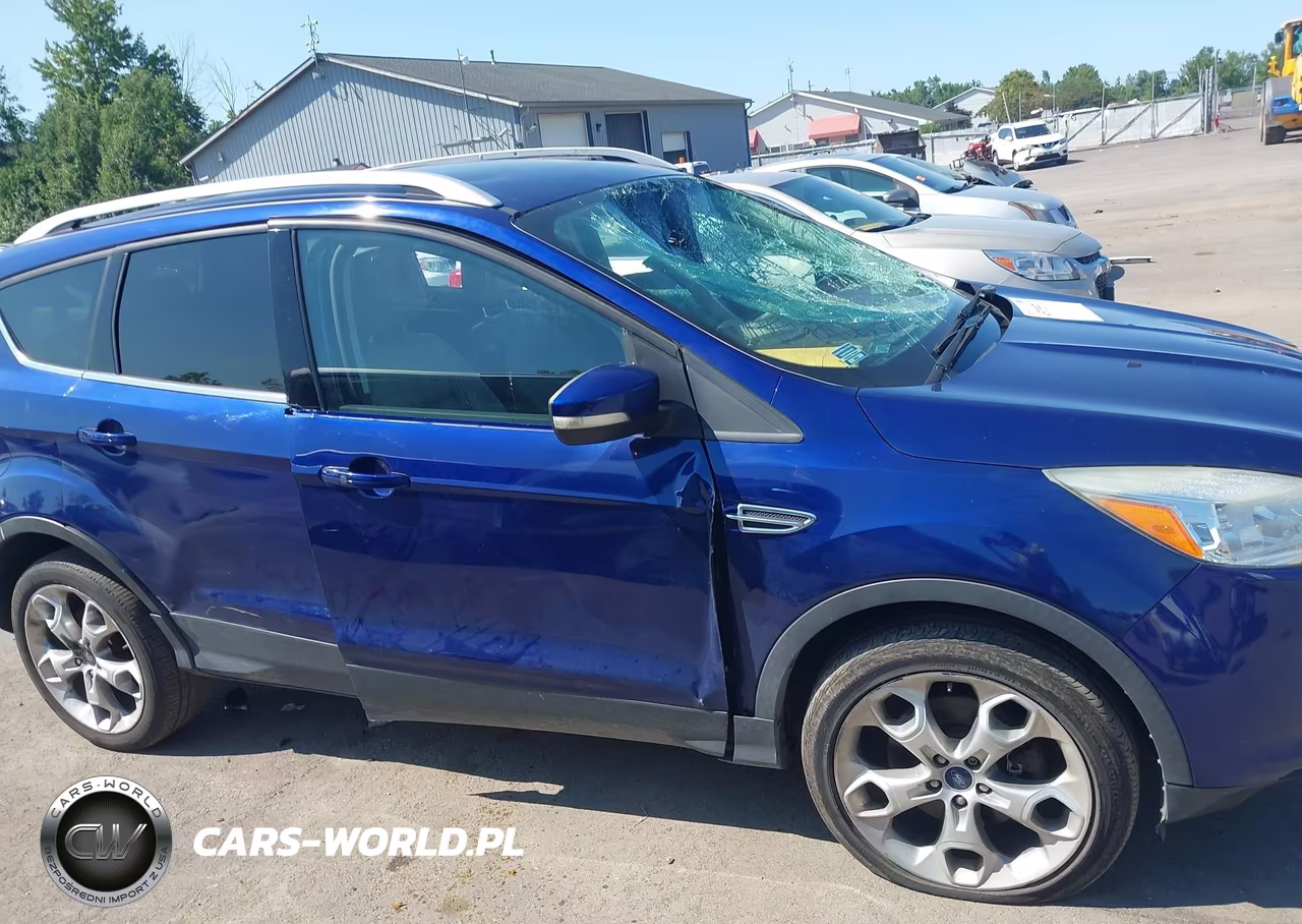 2016 Ford Escape Titanium VIN:1FMCU9J99GUB33471 - 13