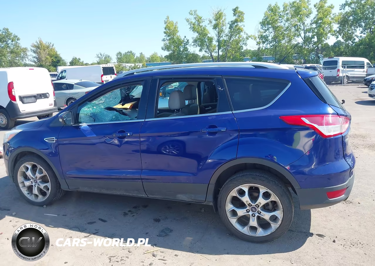 2016 Ford Escape Titanium VIN:1FMCU9J99GUB33471 - 14