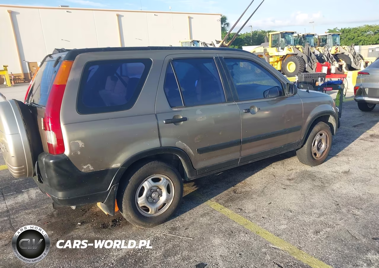 2002 Honda Cr-V Lx VIN:JHLRD684X2C022520 - 4