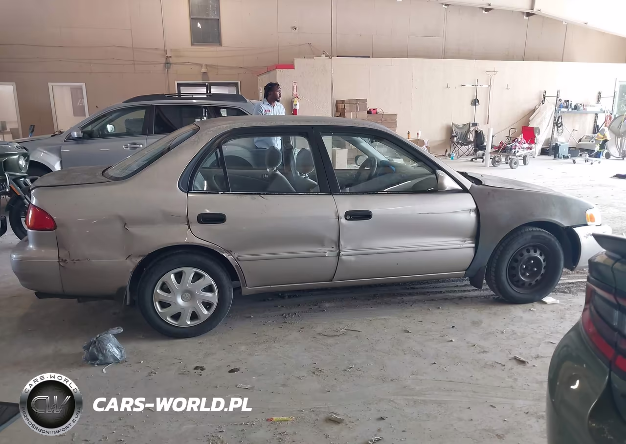 2001 Toyota Corolla Le VIN:1NXBR12E11Z521134 - 13