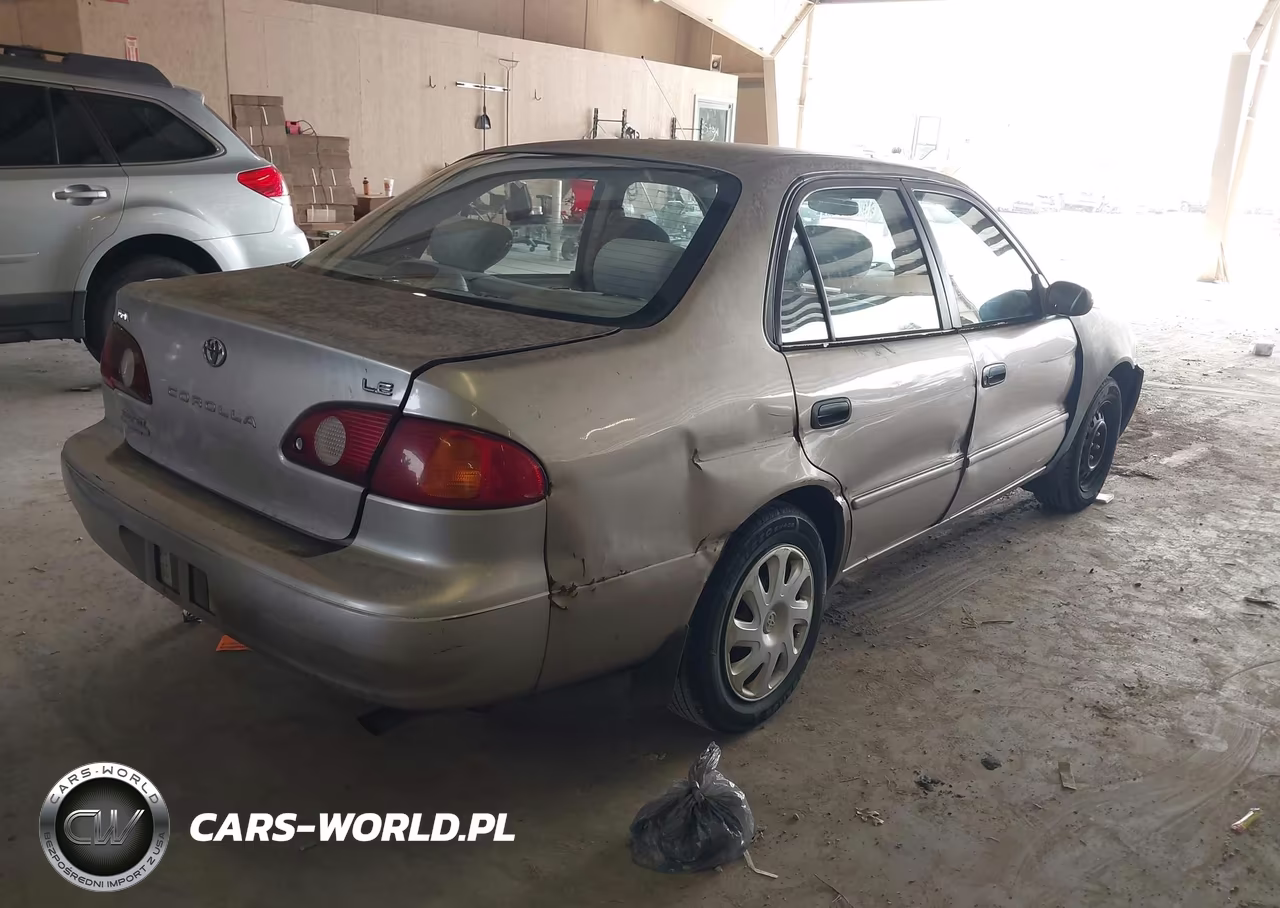 2001 Toyota Corolla Le VIN:1NXBR12E11Z521134 - 4