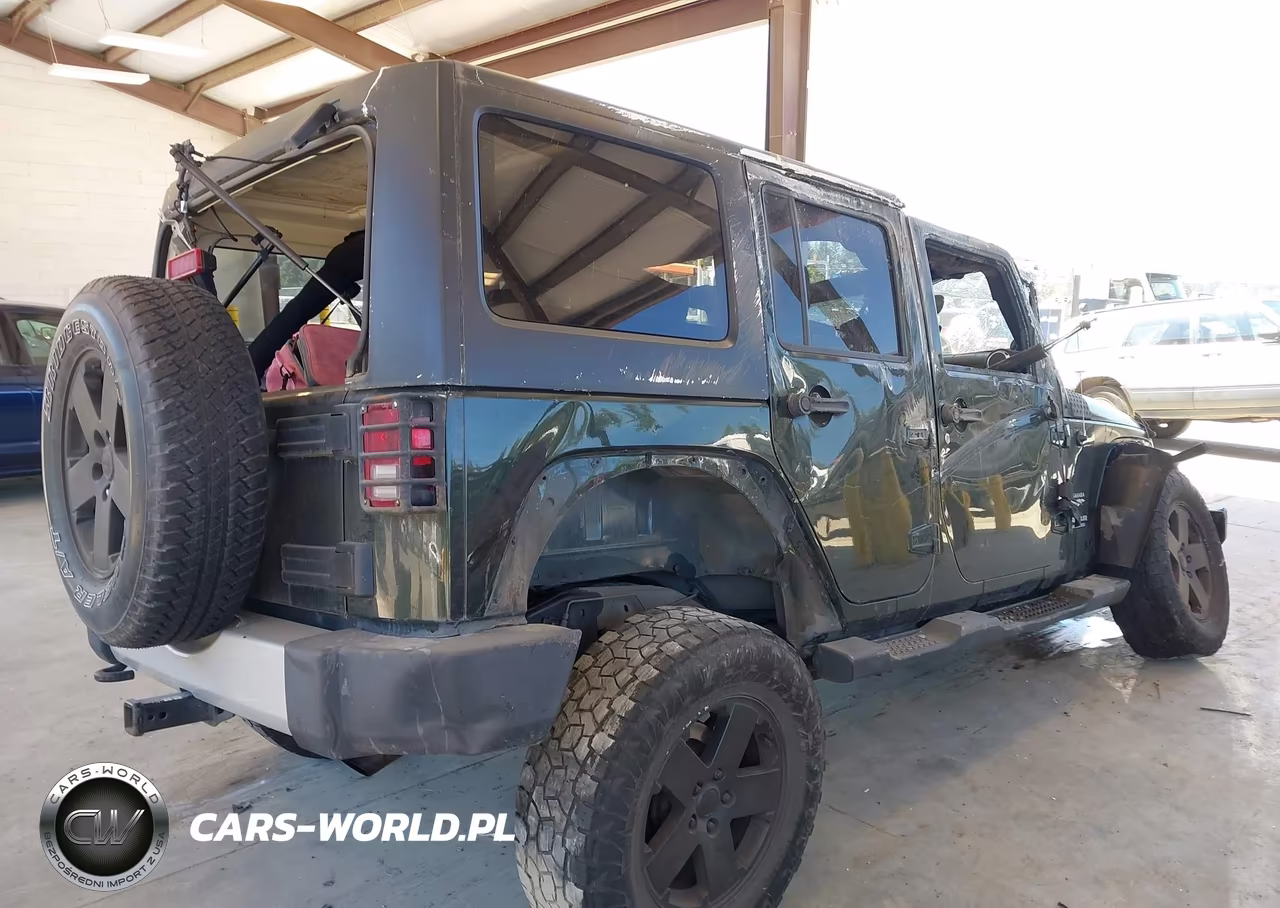 2011 Jeep Wrangler Unlimited Sahara VIN:1J4BA5H19BL518474 - 4