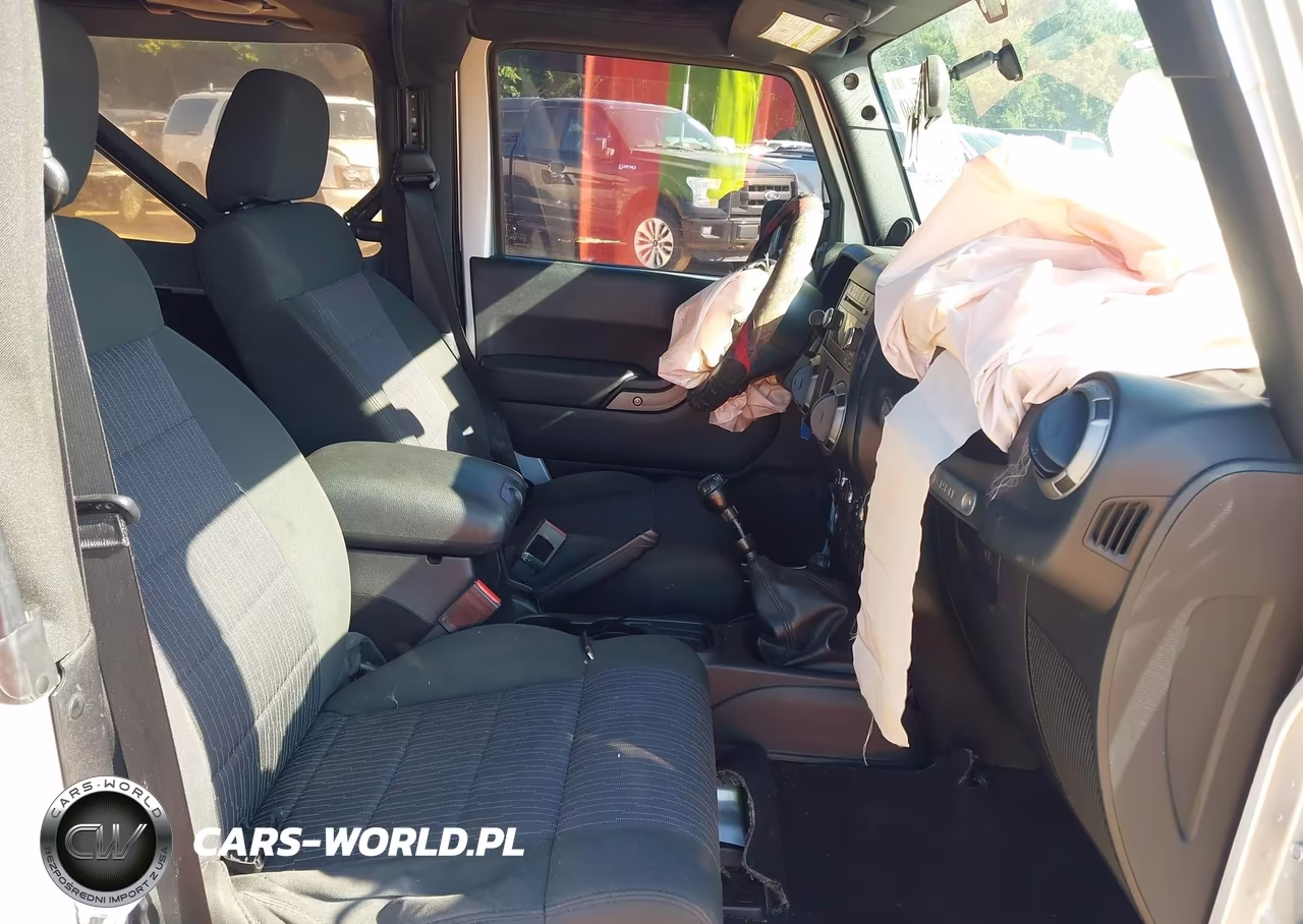 2012 Jeep Wrangler Sport VIN:1C4AJWAG2CL122619 - 5