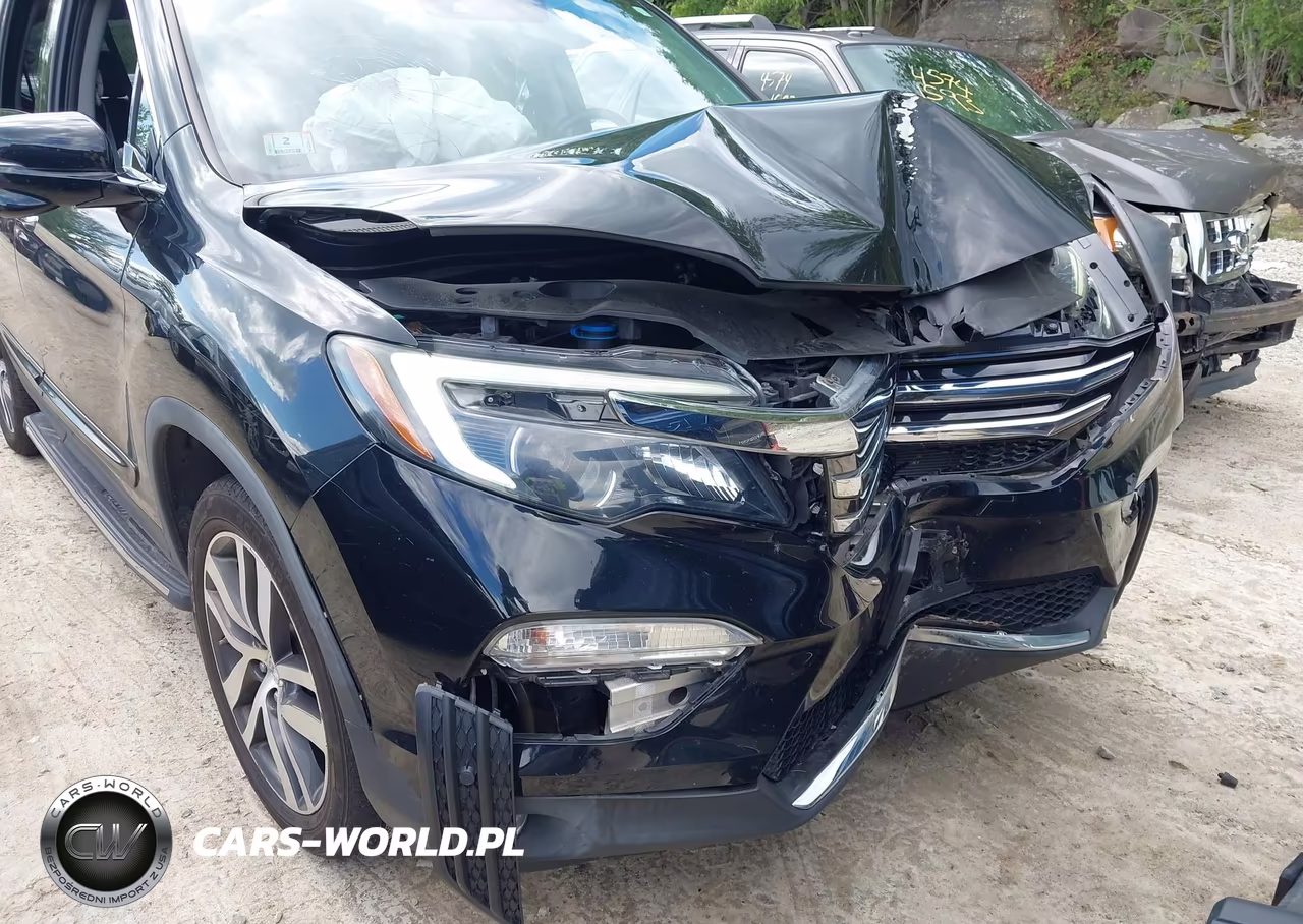 2018 Honda Pilot Touring VIN:5FNYF6H94JB006359 - 18