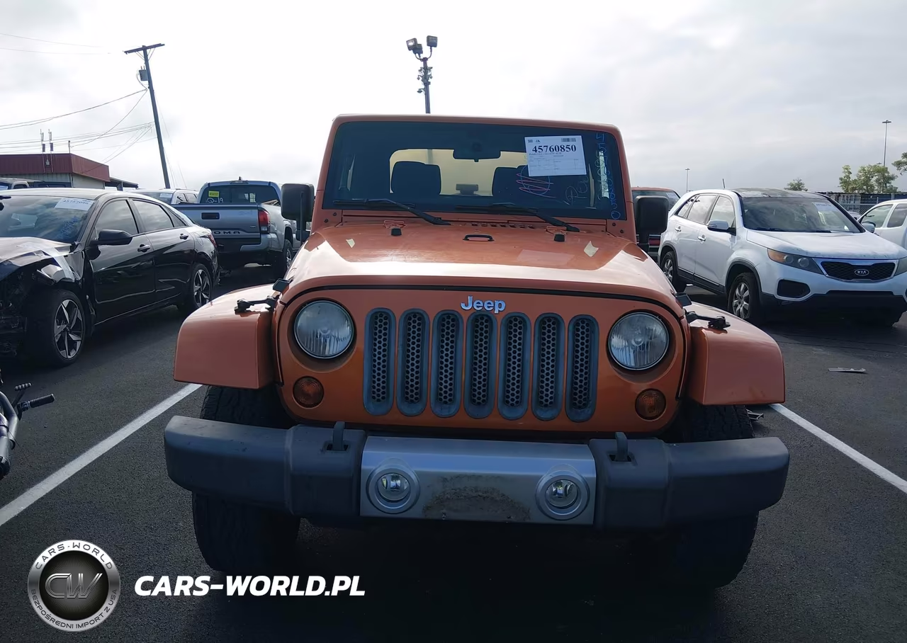 2011 Jeep Wrangler Sahara VIN:1J4GA5D19BL572062 - 12