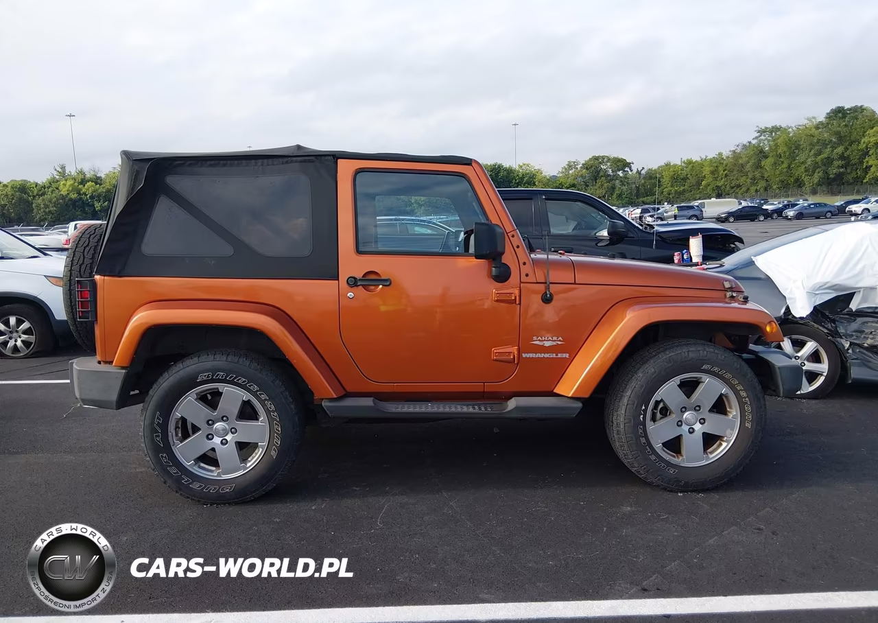 2011 Jeep Wrangler Sahara VIN:1J4GA5D19BL572062 - 13
