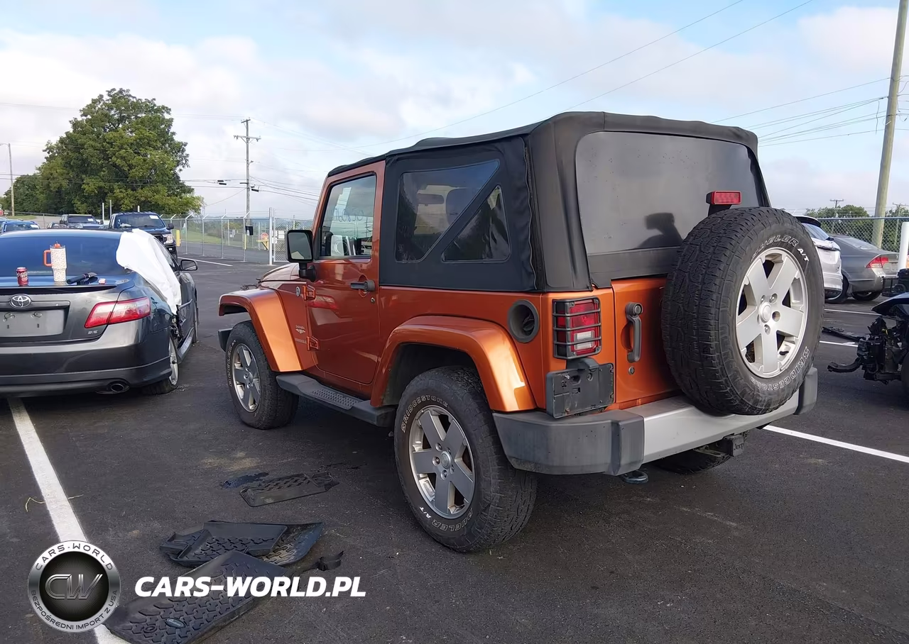 2011 Jeep Wrangler Sahara VIN:1J4GA5D19BL572062 - 3