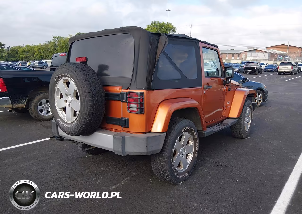 2011 Jeep Wrangler Sahara VIN:1J4GA5D19BL572062 - 4