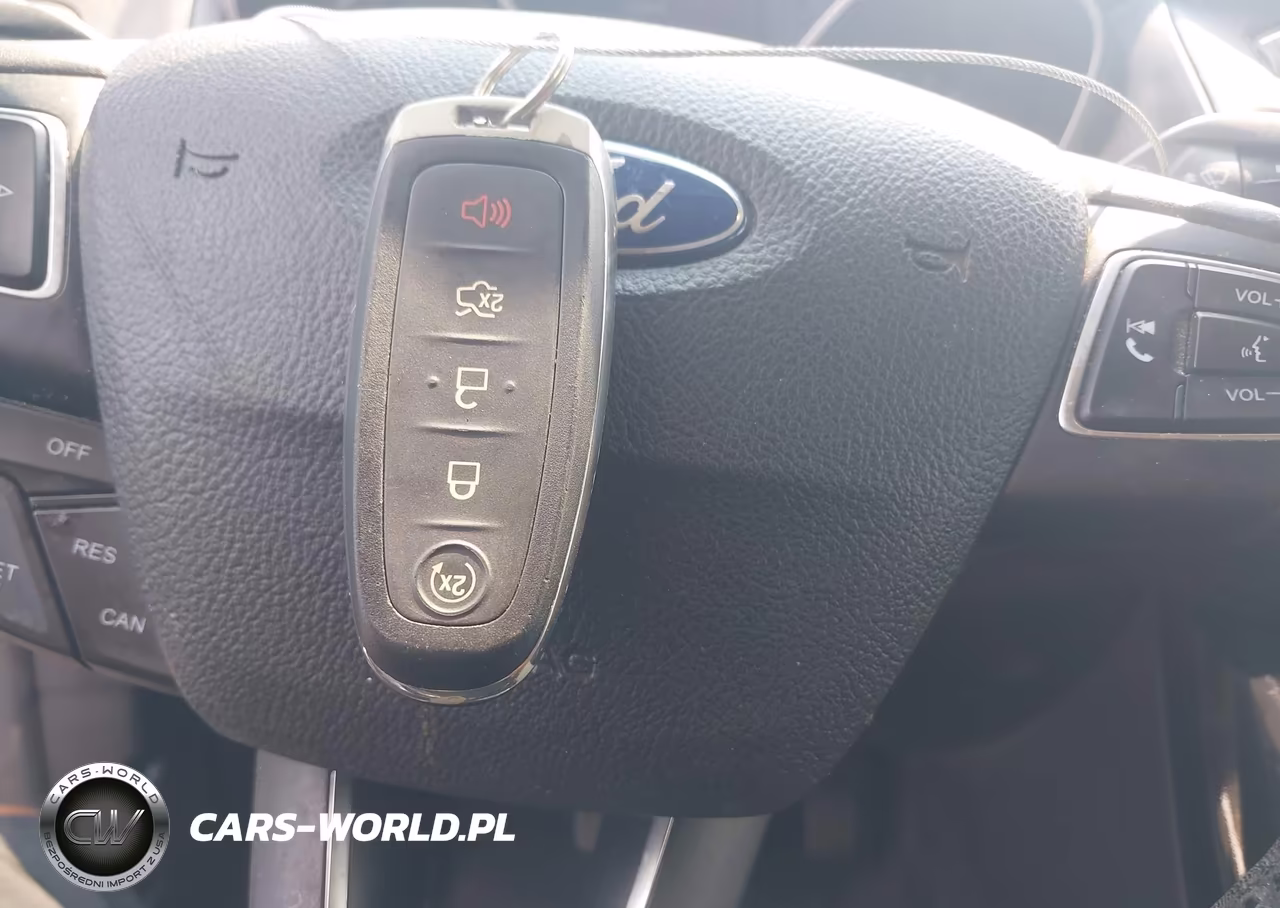 2016 Ford Focus Titanium VIN:1FADP3J26GL335289 - 11