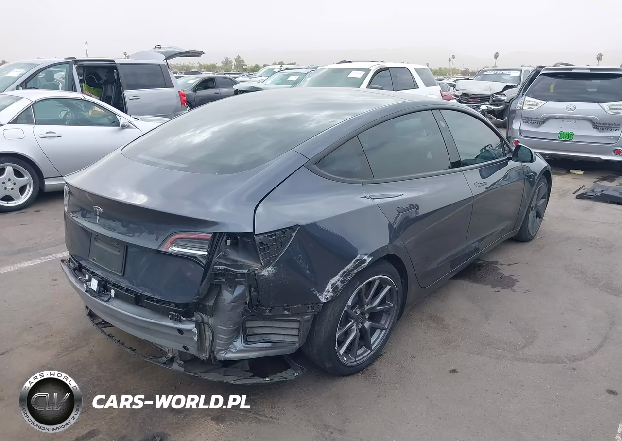 2023 Tesla Model 3 Rear-Wheel Drive VIN:5YJ3E1EAXPF412153 - 4